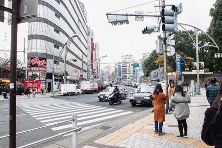 TOKYO, JAPAN - DEC6, 2018: People are rushing to work during peak hours in Tokyo, Japan.のeditorial素材