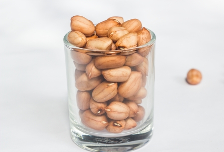 many peanuts on white groundの写真素材