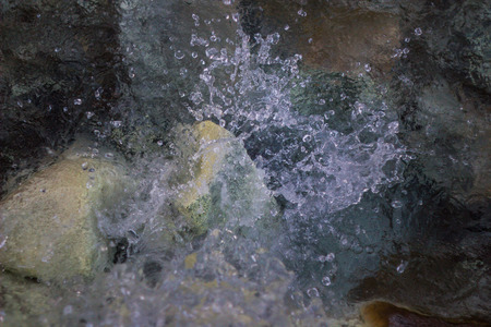 Water flowing down the rock droplets.it so beautiful and to be fresh.の写真素材