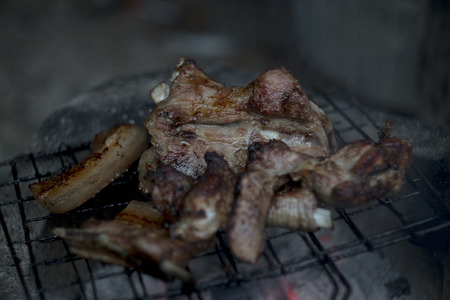 Beef steaks on the grill with flamesの写真素材