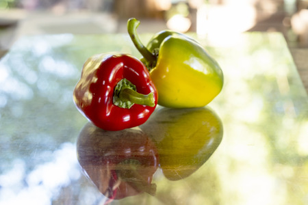 Mexican hot chili peppers colorful  on table wood and glass.の写真素材
