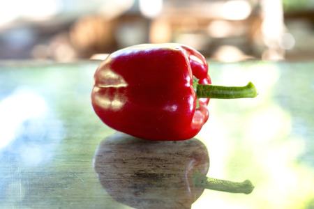 Mexican hot chili peppers colorful  on table wood and glass.の写真素材