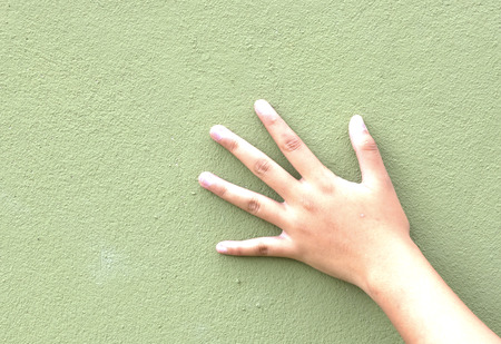 five finger salute hand gesture, on light grey backgroundの写真素材
