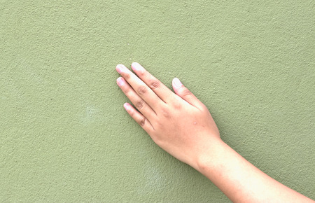 five finger salute hand gesture, on light grey backgroundの写真素材