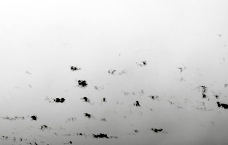 dark gray dramatic sky with large clouds.の写真素材
