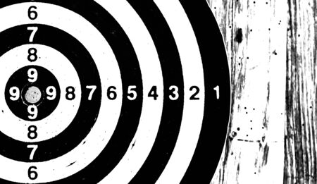 Bullseye is a target of business. Dart is an opportunity and Dartboard on old wood background.