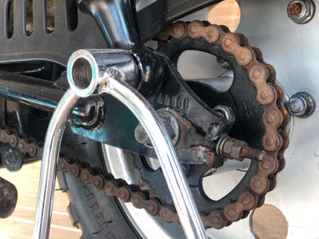 Rusting on a motorcycle chain. Detail of a motorcycle rear chain.の写真素材