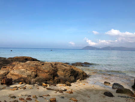 Travel on beach concept. The sea and White sands beach with Clear blue sky.の写真素材