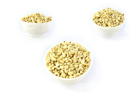 Three different shots are shown the millet in white cupの写真素材
