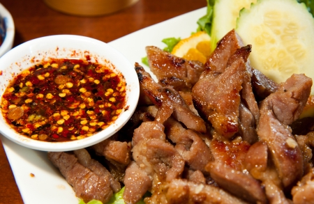 Grill pork neck thai style with spicy sauceの写真素材