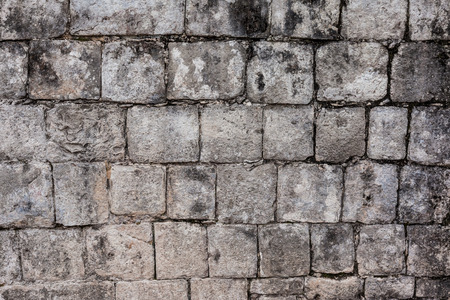 Ancient stone wall in Chichen Itza, Mexicoの写真素材