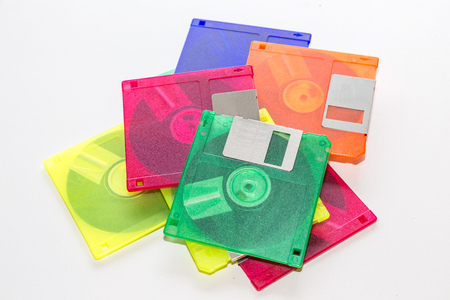 colorful floppy disk on white background.