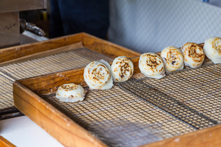 newly cooked traditional umegae mochi in dazaifu temmangu shrine, fuguokaの写真素材