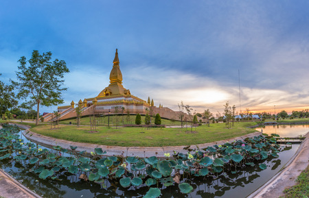 famous Maha Mongkol Bua Pagoda in Roi-ed Thailand at sunset