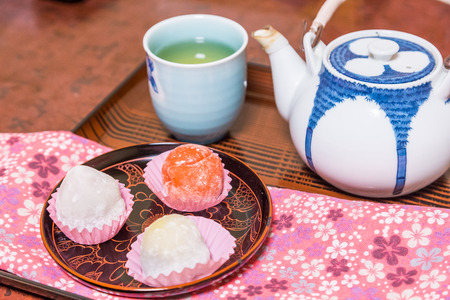 Daifuku with hot green teaの写真素材