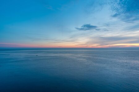 mediterranean sea at sunset near Manarola, Cinque terre, Italyの写真素材