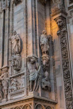 Close up of sculpture that decorating around Duomo  di Milano church in the early morning, Milan Italyのeditorial素材