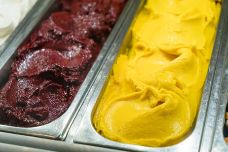 Colorful fruit italian sorbet  gelato ice cream in the gelato shop, Italy