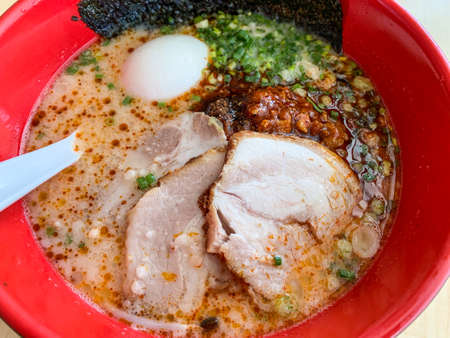 Closeup karaka spicy miso ramen with egg and chashu