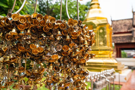 Little golden bells hang in Wat Phra Singh Woramahawihan temple, Chiang Mai, Thailand