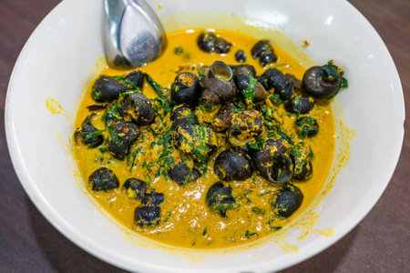 river snail with betel leaves curry  - close upの写真素材