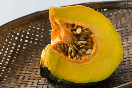 pumpkin on wooden basketの写真素材