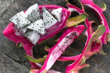 dragon fruit on wooden backgroundの写真素材