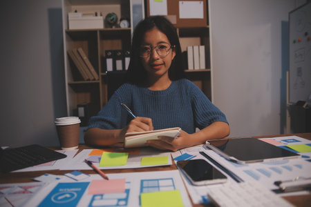 The designer team is designing the uxui system to make the uxui system work well on new phones and support system updates. Website development concept UI UX front end designerの写真素材