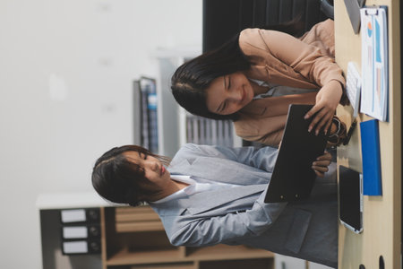 Workers discuss them at the company conferenceの写真素材