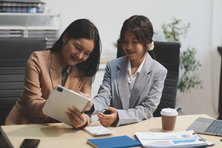 Workers discuss them at the company conferenceの写真素材