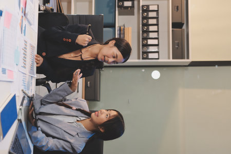 Accounting company provide finance and taxation planning for profitable cash flow, Auditor and accountant team working in office, analyze financial data and accounting record with calculator.Insightの写真素材