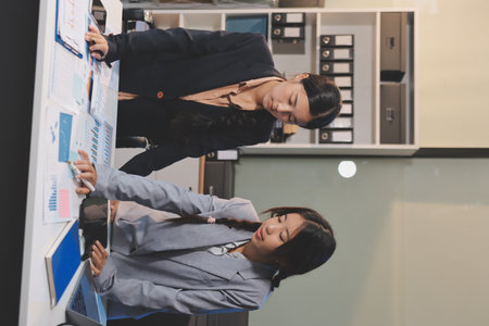 teamwork of tired young business with documents tax laptop computer in office.