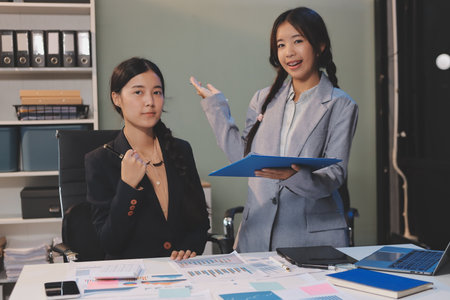 Accounting company provide finance and taxation planning for profitable cash flow, Auditor and accountant team working in office, analyze financial data and accounting record with calculator.Insightの写真素材