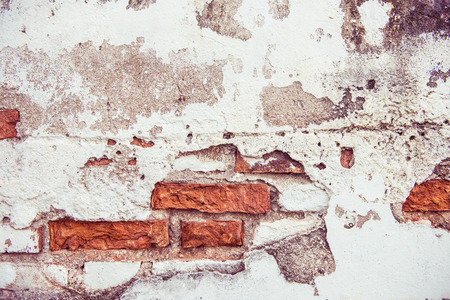 Cracked concrete and grunge brick wallの写真素材