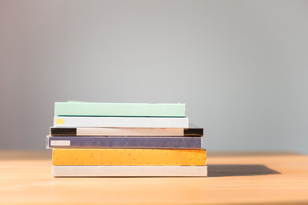 Books on the table  No labels, blank spine の写真素材