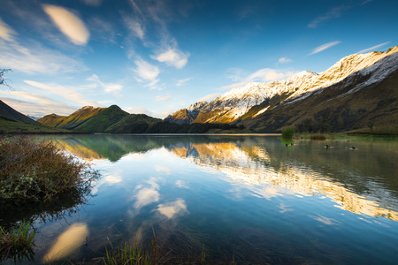Sunrise and Reflection View of Moke Lake near Queenstown New Zealand.の写真素材
