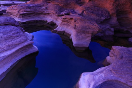 Vibrant colors during sunset at sarmpan bok,Thailandの写真素材