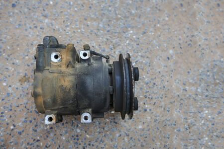 Old automotive air conditioning compressor, Removed from the car