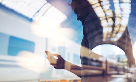 Double exposure of man and smart phoneの写真素材