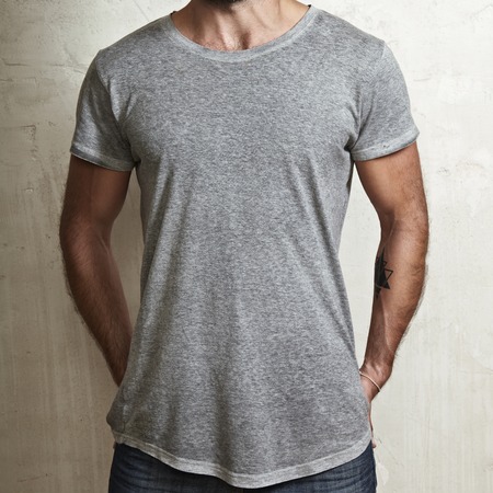 Close-up of a muscular man wearing blank t-shirtの写真素材