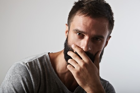 Close-up portrait of a handsome bearded man