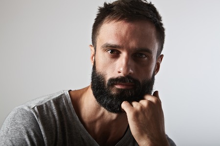 Close-up portrait of a handsome bearded manの写真素材