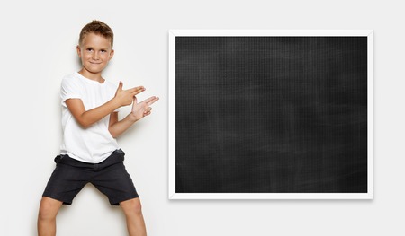 Mock up of young kid showing some action on the white backgroundの写真素材