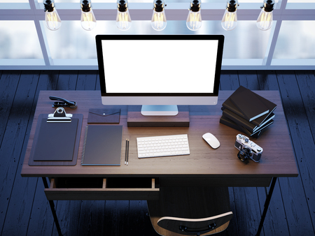 Mock up of generic design computer screen and workspace in modern office with panoramic windowsの写真素材