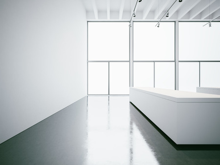 Empty white gallery interior with concrete floor and panoramic windowsの写真素材
