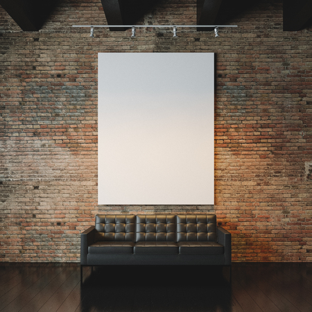 Blank white canvas and vintage sofa on the bricks wall background. Verticalの写真素材