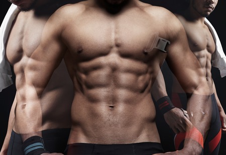 Double exposure of athletic man on black background. Horizontalの写真素材