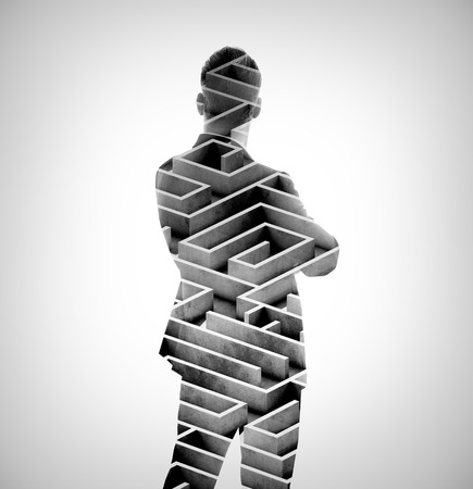 Businessman wearing modern suit and looking on the labyrinth. Photo o double exposure of the labyrinth. Isolatedの写真素材