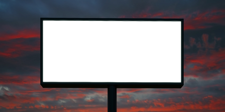 Blank billboard with blank digital screen ready for new advertisement, cloudy sky background. Wide.の写真素材