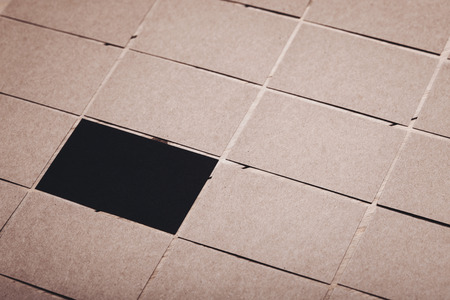 Closeup photo of blank and craft business cards are on a wooden table and laid out next to each other. Black card in the center. Horizontalの写真素材